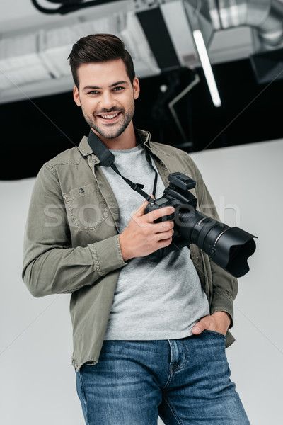 photographer in photo studio stock photo (c) LightFieldStudios (#8624671) | Stockfresh Male Photographer Outfit, Photographer Poses With Camera Men, Camera Man Photographers, Male Photographer, Photographer Outfit, Inktober 2024, Camera Man, Website Photos, Hello Handsome