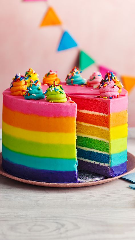 A rainbow-coloured layer cake with rainbow icing outside/ Colourful Cake Designs, Colourful Cakes Birthday, Multi Coloured Cake, Simple Rainbow Cake, Rainbow Cake Inside, Rainbow Theme Cake, Colourful Birthday Cake, Rainbow Cake Ideas, Rainbow Cake Birthday