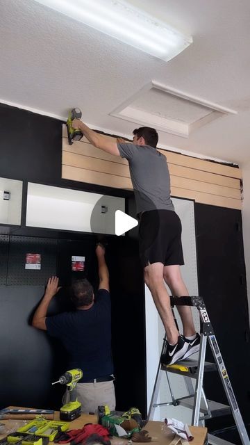 Alessandro Pontes on Instagram: "The only space my wife has no say on what I get to do: THE GARAGE 😎

The garage was a total disaster so I had to order a container to get everything out before starting on our project with @homedepot! I had an idea of adding an accent wall to pop so I decided to paint wall and cabinets black to match the workbench and metal pegboards.

I cut plywood boards into 5” strips to do the entire wall shiplap, including the main door and hide this ugly water heater on the other side for symmetry! I extended the countertop for the workbench to have more room to work on and be able to add a bench seat on the empty side. I covered this boring concrete floor with Husky heavy duty PVC tiles.

My excitement says it all! Now it’s only missing mini fridge full of ice cold Wall Shiplap, Metal Pegboard, Plywood Board, Ice Cold Beer, Paint Wall, Concrete Floor, Main Door, Mini Fridge, The Garage