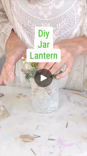 6.8K views · 158 reactions | DIY Jar Lantern | Upcycled this jar into a charming DIY lantern, adding a warm glow to my cozy space! 🕯️✨ #Upcycle #DIYHomeDecor | By Olivia's Romantic Home DIY | Let's upcycle this salsa jar
and create a beautiful Christmas lantern idea. Okay so
I had this salsa jar cleaned it out really well and then taking
a layer of Mod Podge. I'm adding that Mod Podge to the
exterior of my container and then adding some of this
glitter that I found at Walmart. They come in huge
packages. You guys can really get glitterfit this Christmas.
I dug into my craft stash. I had this pretty golden
sparkling ribbon from last season and then just adding
some bits and bobs with some greenery and you guys could get
so creative with this part and really make it shine. Make it
fit your Christmas Jar Lanterns, Jars With Lights Inside Diy, Decorated Jars Ideas, Hand Crafts Ideas Creative, Salsa Jar, Christmas Lantern Ideas, Diy Mason Jar Lights, Diy Lantern, Easy Winter Crafts