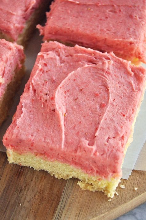 These Strawberry Sugar Cookie Bars are a spring delight! A soft sugar cookie base is topped with a bright, strawberry-infused frosting, with a surprise ingredient: freeze-dried strawberries. Using freeze-dried instead of fresh strawberries ensures the frosting won’t separate, allowing maximum fruit flavor into every bite. You won’t be able to eat just one! #mothersday #springrecipe #dessert #cookies #sugarcookies #springdessert #Easter #Easterbrunch Strawberry Sugar Cookie Bars, Strawberry Sugar Cookie, Soft Sugar Cookie, Strawberry Sugar Cookies, Strawberry Sugar, Spring Recipe, Strawberry Powder, Sugar Cookie Bars, Freeze Dried Fruit