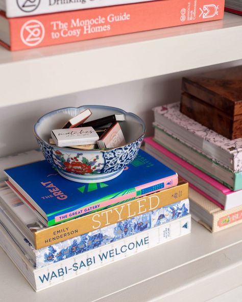 How To Display Matchbooks, Matchbook Decor, Maximalist Coffee Table Decor, Vintage Coffee Table Books, Book Stacks Decor, How To Style Built In Shelves, Matchbook Display, Styling Built In Shelves, Coffee Table Art Books