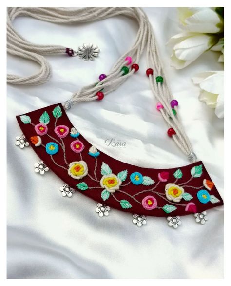 Meraki 🌼 New launch 🌼 Week 3 🧿 This beauty is a Head turner itself 👀😍 The unconventional serenic scene happening here, can never go unlook 👀❤️ Statement Set, hand embroidered and curated, lightweight, adjustable, customisable. DM for details! 🧿 . . . . . . . . [New launch, jewelry collection, handmade jewelry, statement jewelry, unique jewellery, handmade set, necklace set, hand embroidery neckpiece earrings ring, embroidery design, jewelry lover, unconventional jewelry, designer jewellery, f... Hand Embroidery Necklace, Fabric Rings Jewelry, Garba Jwellery, Handmade Fabric Jewellery, Unconventional Jewelry, Ring Embroidery, Embroidery Jewellery, Hand Embroidered Jewelry, Diy Necklace Making