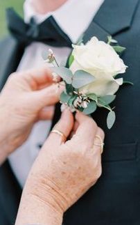 Corsage And Boutonniere Wedding, Boutonniere Wedding White Rose, Simple Wedding Bouquet With Eucalyptus, White Rose Buttonhole Groom Boutonniere, White Rose And Eucalyptus Corsage, White Rose Wedding Boutonniere, White Rose Wrist Corsage Wedding, Boutineer White Rose, Button Holes Wedding Eucalyptus