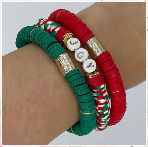 Christmas Jewelry - My Gosh! I love them - Visit to See More IMMEDIATELY! Christmas Polymer Clay Bracelet, Holiday Heishi Bracelets, Christmas Stack Bracelets, Christmas Heishi Bead Bracelets, Cute Christmas Clay Bead Bracelets, Holiday Beaded Bracelets, Holiday Clay Bead Bracelets, Christmas Bracelets Diy, Christmas Charm Bracelet