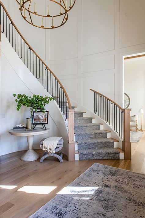 Before and After: A New Light - Utah Style and Design Curved Staircase Foyer, Stairs With Runner, Above Stairs Decor, Staircase Wall Decor, Utah Style, Modern Remodel, Staircase Wall, Becki Owens, Entry Tables