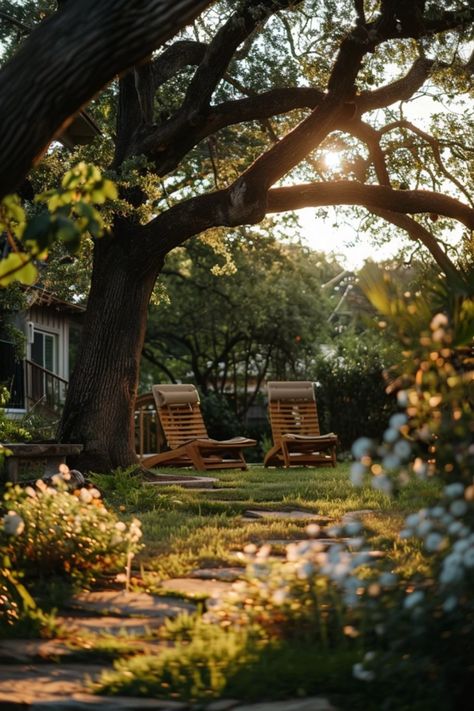 Get inspired by these creative yard decoration ideas perfect for the shaded spaces beneath oak trees. From colorful flower beds to rustic seating areas, discover landscaping concepts that enhance your outdoor space while showcasing the beauty of oak tree canopies. Enhance your yard with shade-loving plants like ferns and hostas, and create intimate pockets for relaxation or entertaining friends outside. This collection of enjoyable design ideas will help you appreciate nature's bounty while loving your backyard oasis. Flower Garden Seating Ideas, Simple Outdoor Seating Area, Simple Outdoor Seating, Ferns And Hostas, Ideas For Flower Beds, Yard Decoration Ideas, Tree Mulch, Colorful Flower Beds, Backyard Seating Area