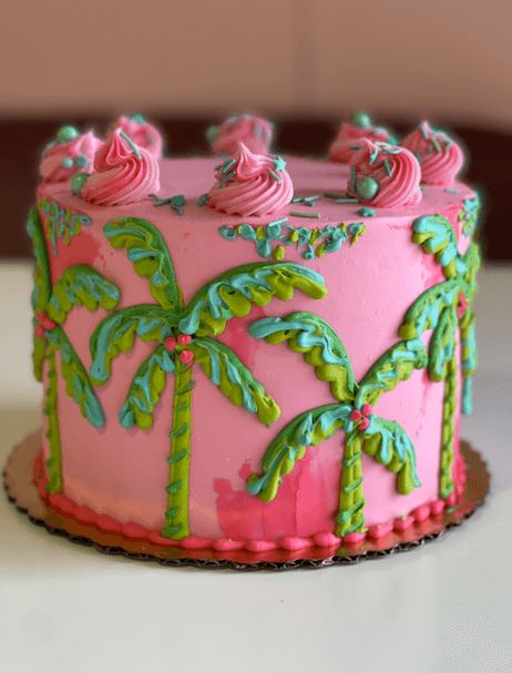 Lilly Pulitzer Cake Ideas, Lilly Pulitzer Birthday Cake, Flamingo Birthday Cakes, Flamingo Cookie Cake, Lilly Pulitzer Cake, Tropical Smash Cake, Unisex Birthday Cake, Beachy Cake, Palm Tree Cake