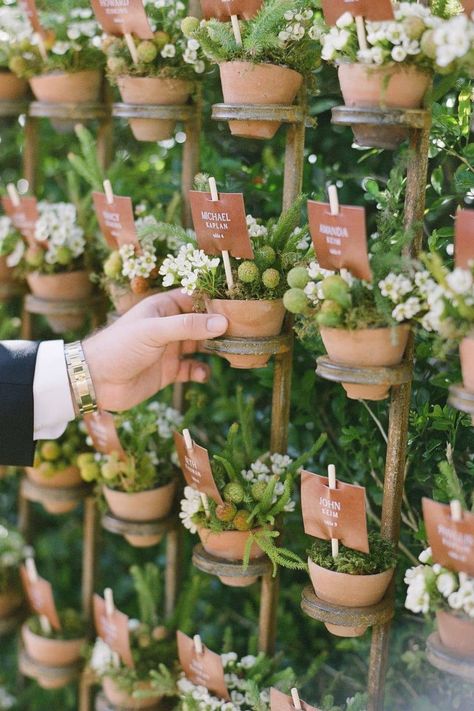 A potted plant escort card wall we’re totally ROOTing for! These potted plants doubled as favors for guests to take home and continue to grow. How cute?! 🪴 | Photography: @ktmerry #stylemepretty #escortcarddisplay #seatingdisplay #escortcards #weddingescortcards Creative Seating Chart, Creative Seating Cards, Mindy Rice Design, Bicycle Wedding, Creative Seating, Seating Chart Ideas, Hydrangea Colors, Eco Wedding, Practical Wedding