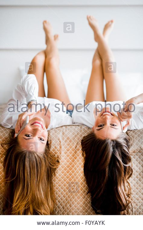 Stock Photo - Two stunning women talking on phones with their hair falling off the bed as they lie upside down Hair Falling, Women Talking, Female Pose Reference, Women Talk, Female Head, Hair Reference, Long Hair Women, Image Processing, Back Women