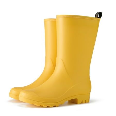 HISEA womens Mid-calf shaft offers a timeless and versatile style that provides coverage and protection in various weather conditions,strut rain boot down the streets, into the city and back to the countryside with ease for Outdoor Gardening Work Walking. It is made from premium PVC material, providing you with complete waterproof protection and the exceptional flexibility. Additionally, it features a removable foam insole.The bottom design is finished with a slip-resistant outsoles for long-las Wide Calf Rain Boots, Yellow Rain Boots, Rain Boots For Women, Rainy Day Fashion, Garden Boots, Rain Boots Women, Short Rain Boots, Yellow Boots, Ankle Rain Boots