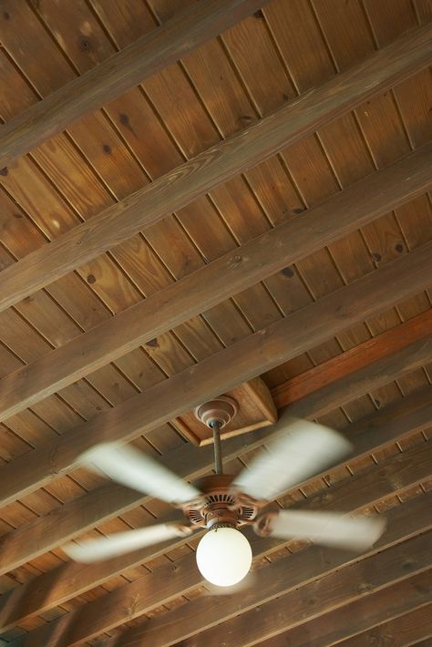 One option as part of a home remodel is to leave the roof rafters exposed by not installing a ceiling. This can give the house a more rugged, open feeling. One drawback to this is that the layer of insulation placed above the ceiling is missing, which can subject the area of the house with the... Decorative Ceiling Panels, Basement Ceiling Options, Exposed Beams Ceiling, Rigid Insulation, Ceiling Options, Exposed Rafters, Ceiling Insulation, Open Ceiling, Porch Ceiling