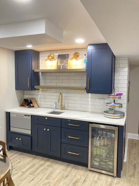 Kitchenette Lighting Ideas, Blue Basement Bar, Kitchenette Blue Cabinets, Wet Bar Ideas With Sink Basement, Small Wet Bar With Sink Cabinets, Blue Kitchenette Basement, Basement Kitchenette Gray Cabinets, Basement Kitchenette With Full Size Fridge, Small Basement Kitchen