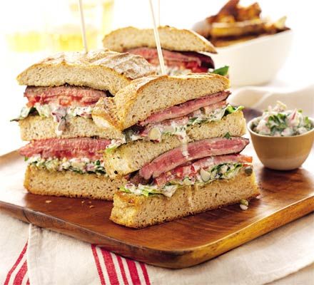 The king of sandwiches, this meaty skyscraper is a Ramsay gastro classic, perfect with a glass of peppery Pinotage Caramelized Onion Sandwich, Steak Sandwich Recipes, Steak Sandwiches, Sliced Steak, Bbc Good Food, Small Food Processor, Steak Sandwich, Bbc Good Food Recipes, Gordon Ramsay