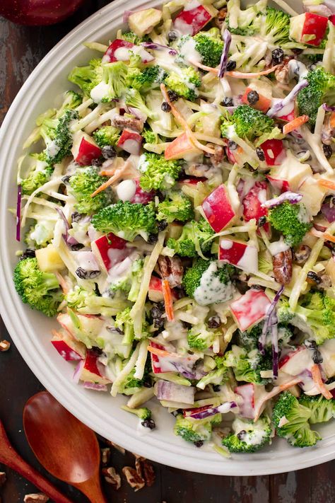 This vibrant, classic Broccoli Apple Salad recipe is a fresh and flavorful side dish great for a party or potluck. It's packed with sweet apples, crunchy pecans, and fresh broccoli and tossed in a sweet, tangy dressing. Ready or prepped ahead of time in less than 15 minutes! Brocolli Apple Salad, Broccoli Apple Salad Recipe, Broccoli Apple Salad, Apple Broccoli Salad, Apple Salad Recipe, Apple Salad Recipes, Sweet Apples, Apple Slaw, Broccoli Salad Recipe