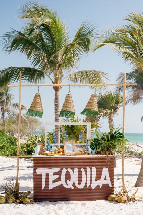 tequila bar, beach wedding, wedding reception, beach wedding decor, wedding inspiration, beach reception ideas, tropical wedding, wedding bar, seaside wedding, coastal wedding, wedding drinks, tequila wedding bar, wedding design, beach party, wedding celebration, romantic island wedding decor, elegant tropical wedding receptions, al fresco wedding tablescapes, breezy wedding table designs, island getaway wedding themes, relaxed beach wedding tablescapes, Tequila Bar Decor, Beach Wedding Bar, Beach Reception Ideas, Beach Theme Wedding Reception, Beach Wedding Foods, Surfer Wedding, Tropical Wedding Reception, Bar Wedding Reception, Getaway Wedding