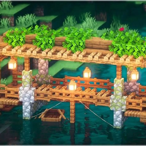 Are you looking for a plain, simple wooden bridge that blends naturally with nature? Then this bridge is for you! It's made with stone pillars, lanterns, and a decorative way of placing leaves on top. The ingenious use of ropes and campfire as flooring added depth to this build. Boats can even travel below this bridge! It has so much functionality with just a simple appearance. Check it out now and try this out in your survival world. Minecraft Cottage House, Minecraft Bridge, Bridge Ideas, Minecraft House Ideas, Minecraft Houses Survival, Minecraft Blocks, Minecraft Farm, Minecraft Cottage, Easy Minecraft Houses