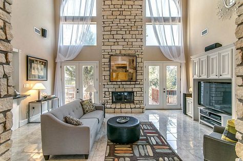 Fireplace With Large Windows On Each Side, Fireplace With Patio Doors On Each Side, Fireplace With French Doors On Each Side, Fireplace With Doors On Each Side, Fireplace With Vaulted Ceiling, Fireplace With Windows On Each Side, Fireplace With Windows, Slate Fireplace Surround, Black Fireplace Surround