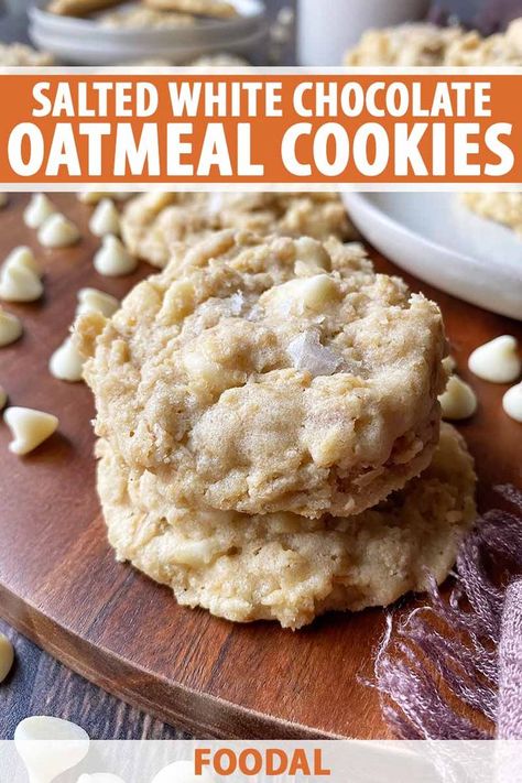 This delightfully sweet and salty version of a classic oatmeal cookie features old-fashioned rolled oats, white chocolate chips, and a perfect pinch of flaky sea salt on top. You'll want to keep a cup of milk at the ready for all your dunking needs. Get the recipe now. #oatmealcookie #sweetandsalty #foodal White Chocolate Chip Oatmeal Cookies, White Chocolate Oatmeal Cookies, White Chocolate Oatmeal, White Chocolate Chip Cookies Recipes, Sea Salt Cookies, Chocolate Chip Oatmeal Cookies, Chocolate Oatmeal Cookies, White Chocolate Chip, White Chocolate Chip Cookies