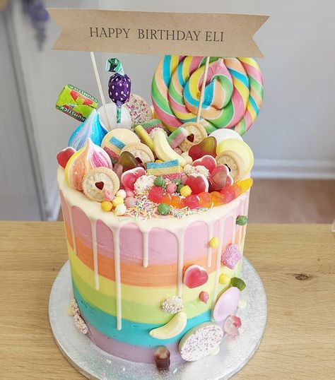 Extra Tall Rainbow Sweetie Overload 🌈🍬🍭🌈 . . . . #cake #cakeshop #bakery #bake #butterfingers #cakeinspiration #cakestagram… Sweets Cake Ideas, Sweet Treats Cake, Rainbow Cake With Lollipops, Rainbow Layer Cake Birthday, Sweetie Cake Ideas, Sweetie Cakes Birthday, Rainbow Lolly Cake, Birthday Cake Sweets, Birthday Cake Lollipop