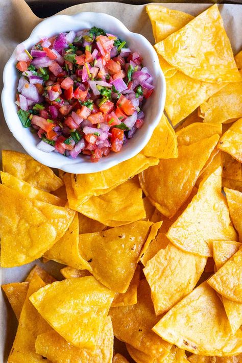 Skip the store-bought bag and make homemade tortilla chips instead! Here’s how we make traditional tortilla chips as well as baked tortilla chips in our own kitchen. A […] Taco Snacks, Kitchen Watch, Fried Tortilla Chips, Inspired Taste, Tortilla Chip Recipe, Baked Tortilla Chips, Tortilla Chip, Homemade Tortilla, Homemade Corn Tortillas