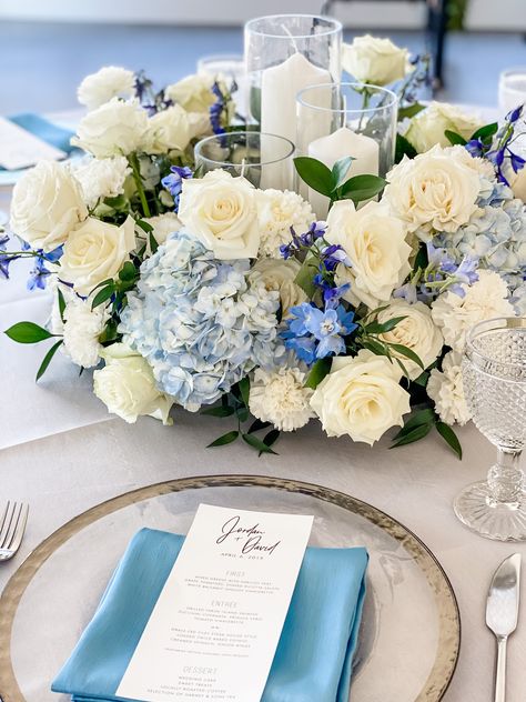 Blue And White Flower Centrepiece, Blue Theme Wedding Centerpieces, White Blue Hydrangea Centerpiece, Tall Blue Floral Centerpieces, Blue And White Roses Centerpieces, Blue Carnation Centerpieces, White Roses And Blue Hydrangeas Centerpiece, Light Blue Wedding Centerpieces Diy, Navy Blue Hydrangea Wedding