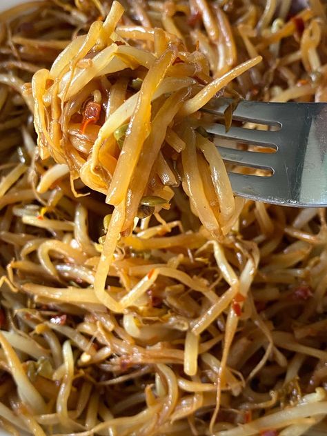 These sauteed bean sprouts are amazing! If you are looking to learn how to cook bean sprouts, this is the easiest way to cook them! Just put raw bean sprouts on a frying pan, add oil and seasonings and they'll cook to perfection in 5 minutes! Sauteed Bean Sprouts Recipe, Bean Sprouts Recipe, Oven Roasted Eggplant, Bean Sprout Recipes, Bean Sprout Salad, Fried Beans, Sprouts Recipe, Whole Roasted Cauliflower, How To Cook Beans