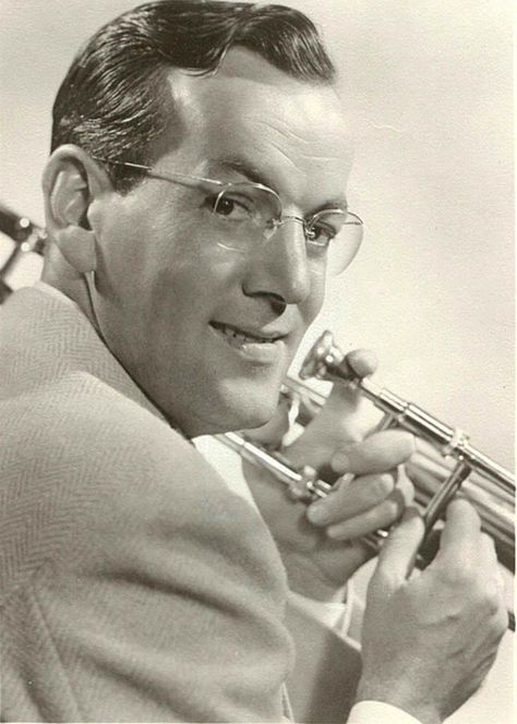 Glenn Miller (1904-1944) was an American jazz musician (trombone), arranger, composer, and bandleader in the swing era. He was one of the best-selling recording artists from 1939 to 1943, leading one of the best known "Big Bands". While he was traveling to entertain U.S. troops in France during World War II, Glenn Miller's plane disappeared in bad weather over the English Channel. Glen Miller, Popular Singers, Hollywood Glamor, Glenn Miller, Jazz Artists, Famous Personalities, Fav Music, Band Music, I'm With The Band