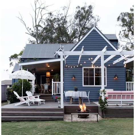 Front Porch Blue House, Navy Blue Beach House Exterior, Blue House With Pergola, Navy Weatherboard House, Small Cottage Paint Exterior, Navy Cottage Exterior, Dark Blue House With Deck, Blue House With Porch, Nautical House Exterior