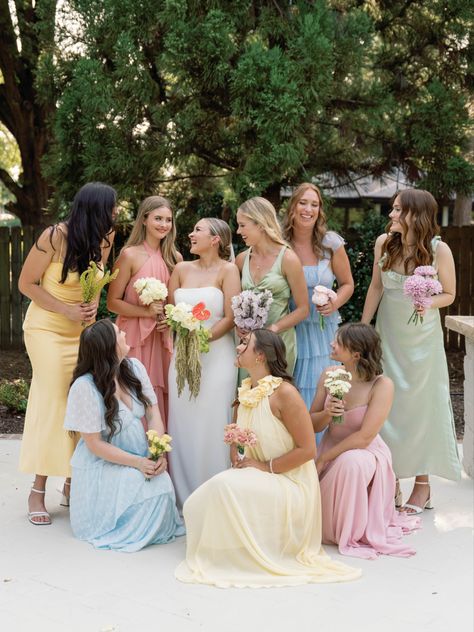 Pastel Color Palette Wedding Bridesmaid Dresses, Satin Bridesmaid Dresses Multi Color, Pastel Coloured Bridesmaid Dresses, Blue Pink Green Bridesmaids, Wildflower Wedding Guest Attire, Mismatched Bridesmaid Dresses Garden Party, Pink Yellow Blue Wedding Bridesmaid Dresses, Mixed Satin Bridesmaid Dresses, Spring Wedding Ideas Colors Bridesmaid Dresses