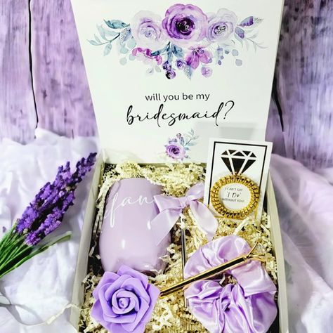 Calling all brides-to-be! Ready to ask, “Will you be my bridesmaid?” Look no further! NIMA Gifts has the ultimate proposal gift boxes to dazzle your besties. 💍✨ Check out nimagiftsco.com 💗 . . . . #bridesmaidgifts #2024bride #bride2be #weddingfavors #newbride #bridalparty #teambride #bridesquad #personalizedtumbler #weddingideas #newlyengaged #shopsmall #weddinginspo #customtumbler #bacheloretteparty #2024wedding #customgifts #weddingluxe #weddingplanning #weddinginvitations #weddingfavors... Will You Be My Bridesmaid Purple, Bridesmaid Proposal Box Ideas Purple, Purple Bridesmaid Proposal, Lavender Bridesmaid Proposal, Bridesmaid Proposal Purple, Bridesmaid Proposal Lavender, Purple And Gold Wedding Theme, Themed Bridesmaid Proposal, Faces Lighting