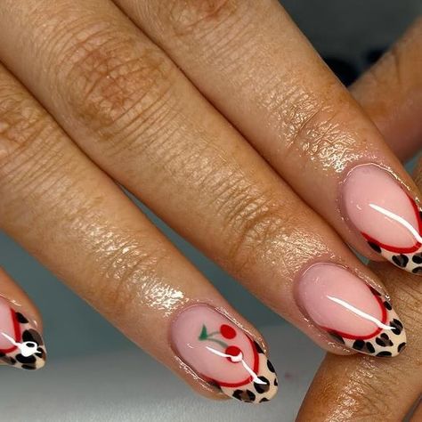 Meghan on Instagram: "I love this trend 🐆🍒 .  . . #lepoardprint #cheetahnails #cherrynails #showscratch #nailsofinstagram #nails #naildesigns #nail_me_good_ #nailinspo #nailsaddict #nailobsession #nailsswag #nailitmag #acrylicnails #scratchmagazine" Gel Mani Designs Art Ideas, Cherry Leapord Nails, Cherry Lepord Nails, Nails Design Western, Cherry And Leopard Nails, Fun Dark Nails, Cheetah Print Cherry Nails, Cheetah Nails With Cherries, Leopard Print Nails With Cherry