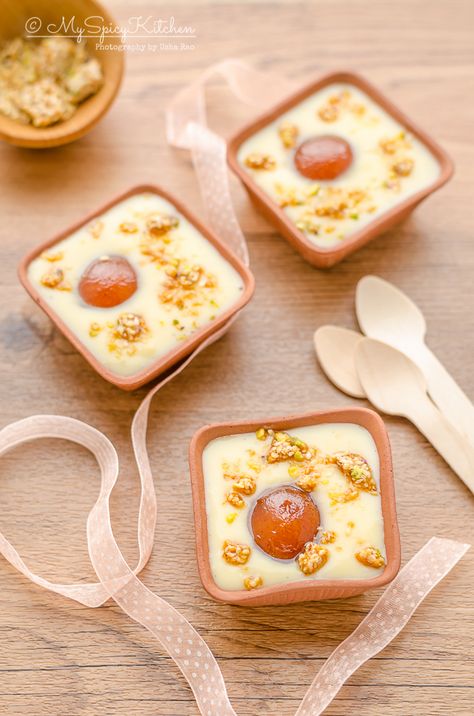 Gulab jamun custard is a fusion Indian dessert with plain custard is served with gulab jamun and topped with praline or nuts brittle. Indian Dessert, Gulab Jamun, Indian Dessert Recipes, Indian Sweet, Fusion Food, Indian Desserts, Indian Sweets, Indian Snacks, Köstliche Desserts