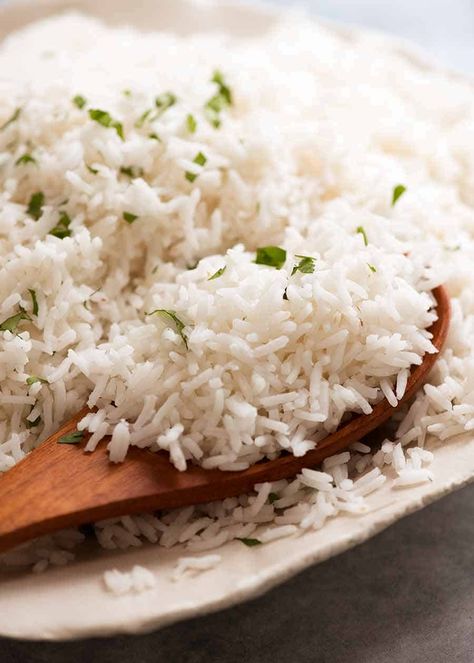 Close up of spoon scooping up fluffy Basmati Rice Thai Cashew Chicken, Basmati Rice Recipes, Chicken Cashew Stir Fry, Cooking Basmati Rice, Rice Varieties, Recipetin Eats, Lime Rice, Cilantro Lime Rice, Cashew Chicken