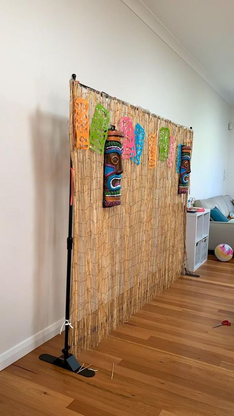 How to set a hawaiian backdrop [Video] | Hawaiian party theme, Hawaiian party decorations, Luau party decorations Diy Craft Show Backdrop, Hawaiian Birthday Party Backdrop, Indoor Hawaiian Party, Aloha Photo Booth Backdrop, Hawaiian Photo Booth Backdrops Luau Party, Hawaii Party Backdrop, 50th Birthday Hawaiian Theme, Moana Backdrop Ideas Diy, Hawaiian Theme Party Backdrop