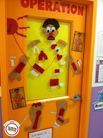 What a fun way to decorate the center! Each classroom is a different board game theme! Operation Game Door Decoration, Pe Classroom, Nurse Bulletin Board, Board Game Themes, Child Care Center, School Nurse Office, Classroom Science, Game Decor, Teacher Survival