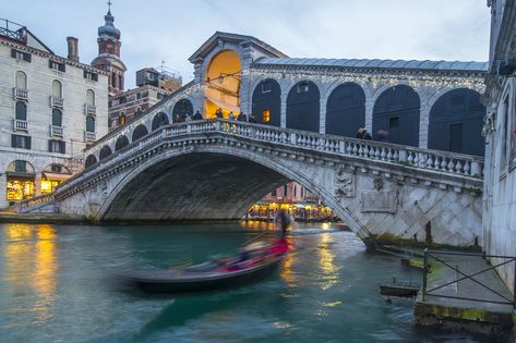 The Rialto Bridge is among most famous bridges in Venice and the oldest to cross the Grand Canal, the main thoroughfare in the city's commercial hub. Tuscany Map, Italy Wall Decor, Gondola Venice, Grand Canal Venice, Famous Bridges, The Merchant Of Venice, Italy Poster, Rialto Bridge, Cool Wall Decor