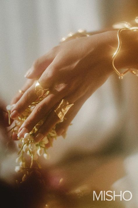 Wishing everyone a beautiful and light Diwali day. Pictured here, MISHO's Flow Combination Rings and Wavy Pala Bangles ✨ gold bangles, gold rings, jewelry photography, gold jewellery, gold jewelry #diwali #mishodesigns #jewelleryphotography #jewelryphotography #goldjewelry #goldjewellery Aesthetic Indian Photography, Aesthetic Jewelry Photography, Light Diwali, Fine Jewelry Photography, Fashion Jewelry Editorial, Diwali Jewellery, Bangle Stack, Aesthetic Jewellery, Product Photoshoot