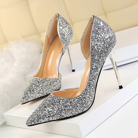 A pair of Dress First Women's Fashion Closed Toe Classic Pumps in black, featuring a sleek and timeless design, perfect for formal occasions and versatile enough for everyday wear. Ladies Shoes, Wedding Shoes, High Heels, Pumps, Glitter, Heels, Silver