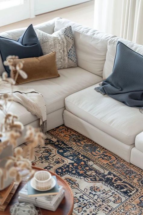 How To Place A Sectional On A Rug: Coordinated Living Space Sectional Sofa Rug Placement, Living Room Rug Placement With Sectional, Rug Under Sectional Sofa Layout, Couch Rug Placement, Styling Sectional Sofa, Sectional With Rug, Rug Under Couch Placement, Rug With Sectional Couch Layout, Rug Under Sectional Sofa