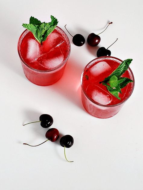 Cherry Pomegranate Mojito by The Redhead Baker Cherry Pomegranate Cocktail, Pomegranate Mojito, Pomegranate Cocktails, Mint Cocktails, Cherry Syrup, Agave Syrup, White Rum, Pomegranate Juice, Sweet Cherries