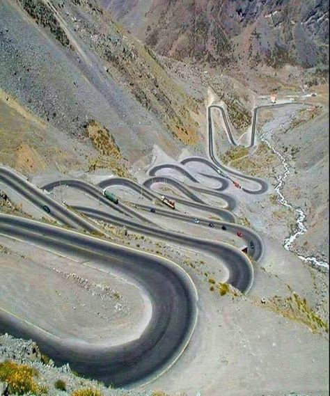 This mountain road is in the Andes between Argentina and Chile. Its name is Paso Del Cristo Redentor, but locals call it Los Caracoles, which means "Snail's Pass". Chile Mountains, Dangerous Roads, Beautiful Roads, Andes Mountains, Winding Road, 웃긴 사진, Incredible Places, Salzburg, Aerial View