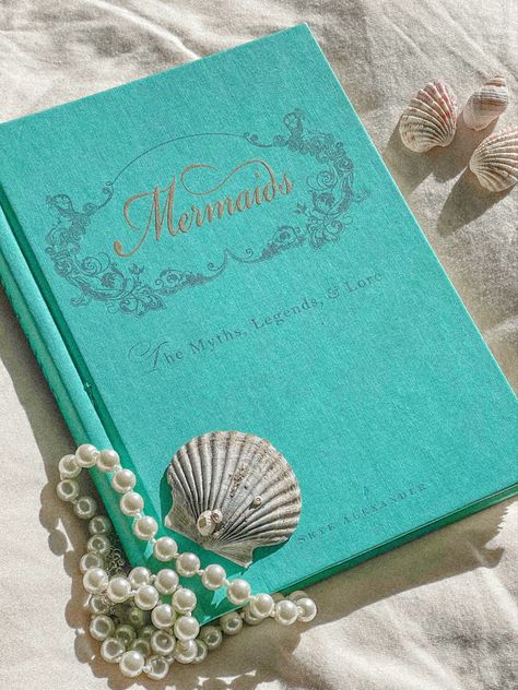 Blue Mermaids Book, Pretty Seashells, Pearl Necklace Mermaid Book Aesthetic, Mermaid Book, Aesthetic Mermaid, Siren Aesthetic, Siren Core, No Ordinary Girl, Mermaid Seashell, Mermaid Books, Summer Aesthetics