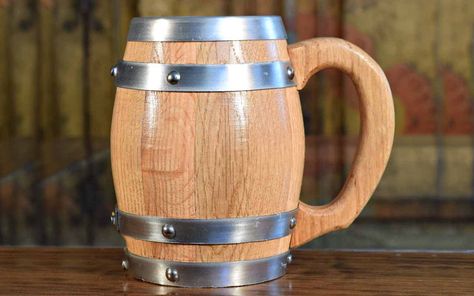 UrbanDaddy | Slideshow: 10 Glorious Oktoberfest Drinking Vessels Wooden Beer Mug, Drinking Vessels, Wooden Barrel, Glass Coffee Mugs, Oak Barrel, Whiskey Barrel, Coffee Mug Sets, Wine Barrel, Stainless Steel Band