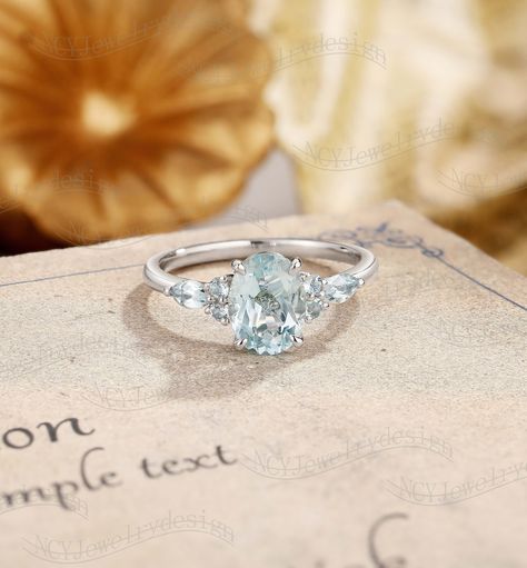 Oval Aquamarine Engagement Ring, Vintage Aquamarine Ring White Gold, Cluster Ring Women, Marquise Aquamarine Ring, Dainty Promise Ring Engagement Ring Blue Stone, Vintage Aquamarine Ring, Aquamarine Engagement Ring Vintage, Aquamarine Ring Vintage, Vintage Moissanite Engagement Ring, Dainty Promise Ring, Opal Engagement Ring Set, Unique Promise Rings, Marquise Cut Engagement Ring