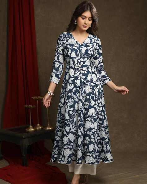 Elevate your style with our Exquisite Navy Blue Floral Printed Kurta. The A-Line Flared design is highlighted with beautiful lace detailing. This versatile piece can be worn as a kurta or paired with the optional pant for a complete look. Crafted with quality materials, it offers both comfort and elegance. #sujatra #sujatraglobal #sujatrakurtis #floralkurta #printedkurta #floralprint #alinekurta #flared #lacedetails #cottonkurta #floralcotton #cottonprints Flared Kurti Designs, Flared Kurti, Kurti Pant, A Line Kurta, Kurtis With Pants, Lace Pants, Embroidery Neck Designs, Churidar, Cotton Pants