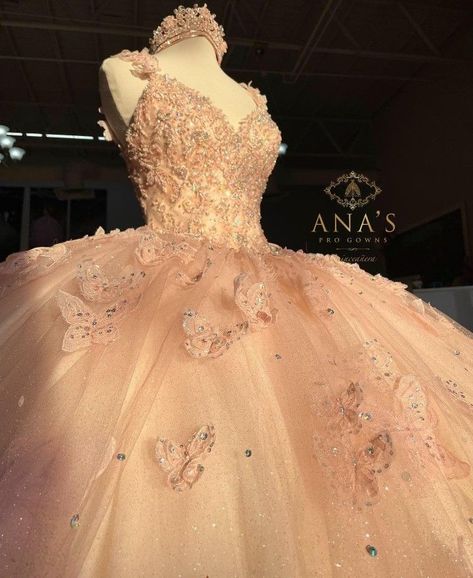 Quincenera Dresses Champagne Pink, Pink And Gold Xv Dress, Pink Blush Quinceanera Dress, Pink Quince Dress With Butterflies, Pastel Pink Quince Dresses, Peach Quince Dress, Quince Dresses With Butterflies, Quince Dresses Butterfly, Rose Quinceanera Dresses