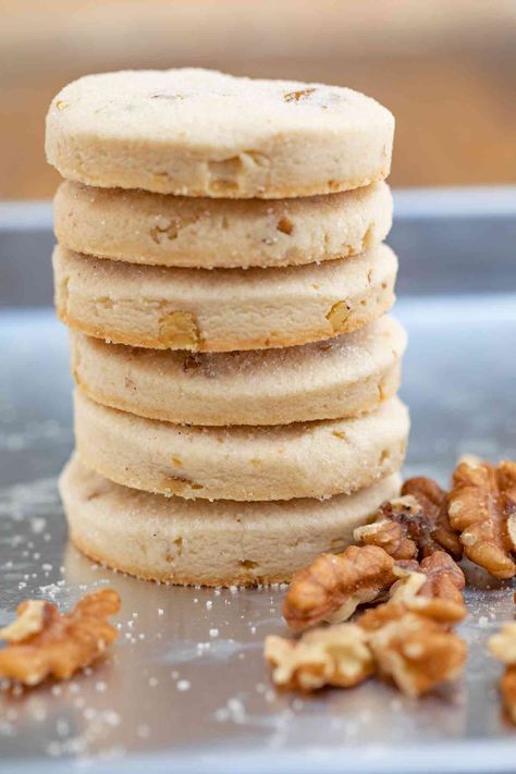 German Walnut Shortbread Cookies made in a traditional shortbread style with coarsely chopped chunks of walnuts, these are the perfect Christmas cookies. #shortbread #cookies #walnuts #baking #dessert #christmas #dinnerthendessert Walnut Shortbread Cookies, Walnut Shortbread, Bakery Chocolate Chip Cookies, Shortbread Cookies Recipe, German Christmas Cookies, German Cookies, Dinner Then Dessert, Levain Bakery, Raspberry Cookies