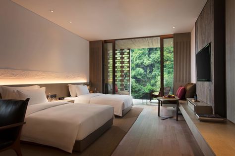 Dwell - A Chinese Sugar Mill From the 1960s Becomes a Cave-Inspired Hotel Alila Yangshuo, Twins Bedroom, Hotel Bedroom Design, Twins Boy, Hotel Room Interior, Twin Bedroom Sets, Bunk Bed Designs, Hotel Room Design, Twin Bedroom