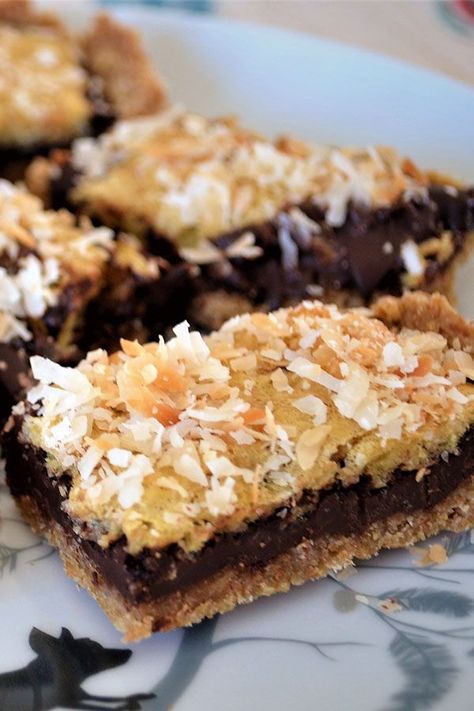 Looking for dessert recipes? Try baking these chocolate coconut bar cookies. Use chocolate chips and sweetened coconut to bake these easy dessert bars for a dessert recipe. Coconut Bar, Coconut Chocolate Bars, Chocolate Chip Bars, Coconut Desserts, Coconut Bars, No Bake Bars, Coconut Cookies, Bar Cookies, Pastry Blender